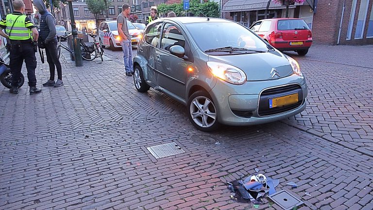 Scooterrijder zonder rijbewijs gewond bij botsing in Marktstraat